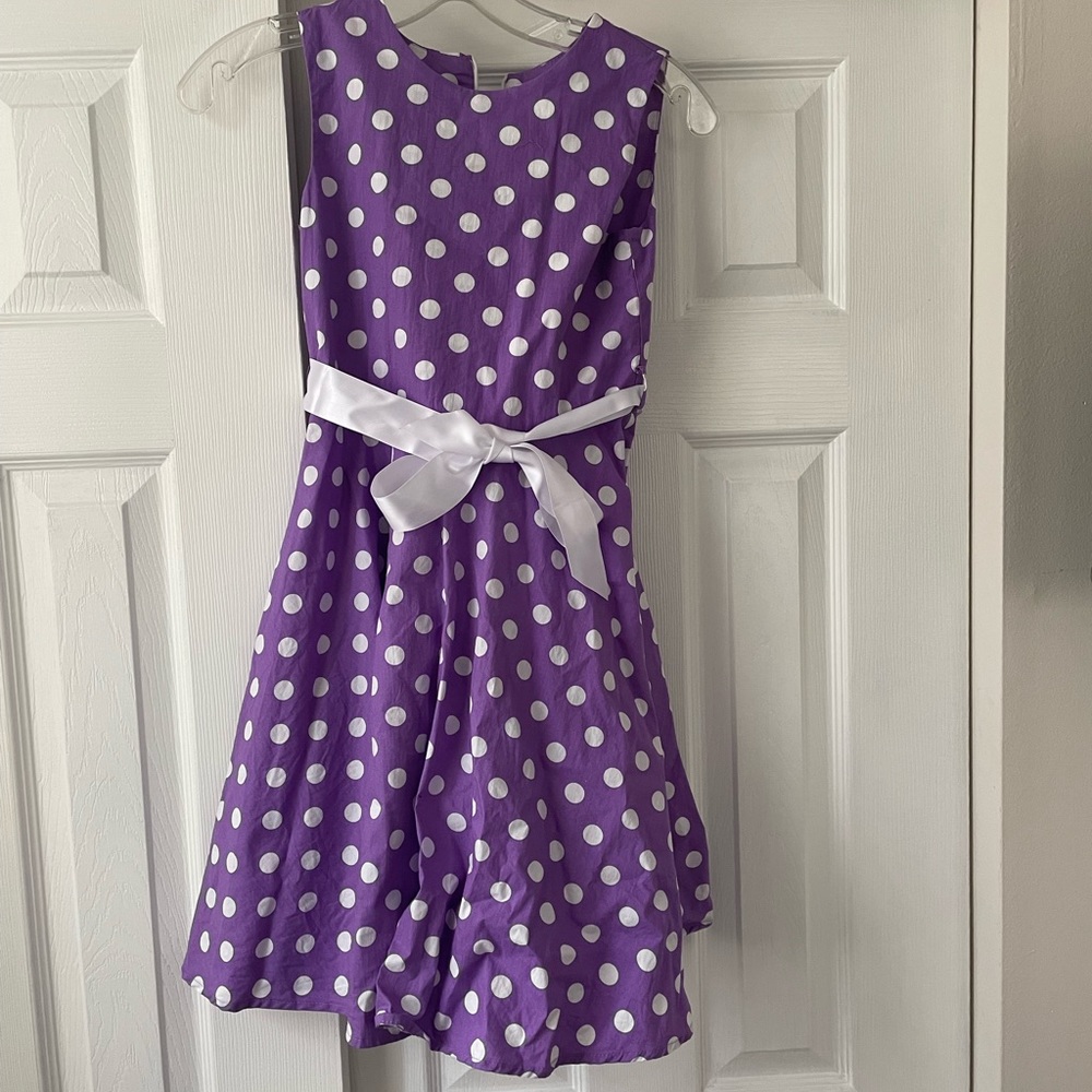Child’s purple with white dot dress
